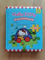 Hello Kitty - Puzzlebuch - 4 Puzzles mit je 6 Teilen - ab 3 Jahren