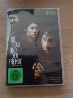 Die Frau und der Fremde