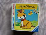 Mein Hund: Domino und eine Spielzeugfigu Mein Hund: Domino und eine Spielzeugfigu