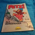 Petzi als Bergsteiger