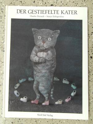 gebrauchtes Buch – Perrault, Charles [Mitverf – Der gestiefelte Kater. Ein Märchen von Charles Perrault, erzählt von Kurt Baumann mit Bildern von Stasys Edrigevisius