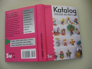 gebrauchtes Buch – Axel Hennel und Jürgen Berg – Katalog - Spielzeug aus dem Ei