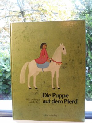 Die Puppe auf dem Pferd