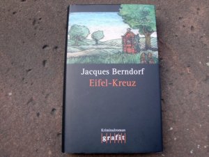 gebrauchtes Buch – Berndorf, Jacques  – Eifel-Kreuz. Kriminalroman. Umschlaggestaltung von Peter Bucker.