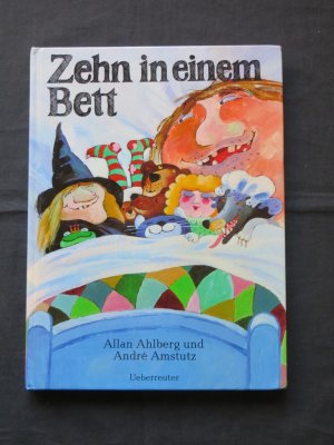 Zehn in einem Bett
