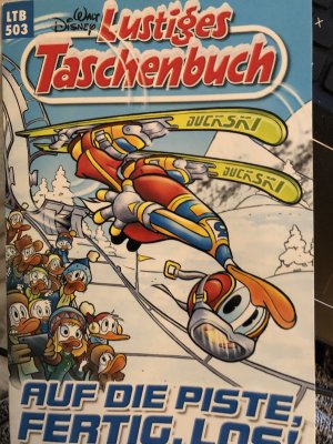 gebrauchtes Buch – Walt Disney Lustiges Taschenbuch – Auf die Piste, fertig, los!