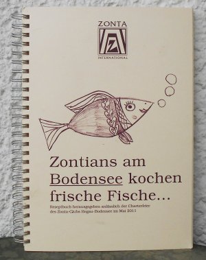 Zontians am Bodensee kochen frische Fische...