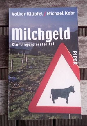 gebrauchtes Buch – Klüpfel, Volker; Kobr, Michael – Milchgeld - Kluftingers erster Fall