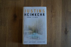 gebrauchtes Buch – Johnston, Bret Anthony – Justins Heimkehr