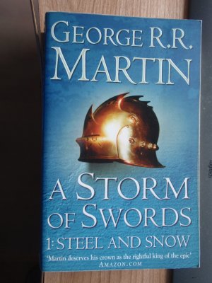 gebrauchtes Buch – George R.R – A Storm of Swords   -   1.  Steele and Snow