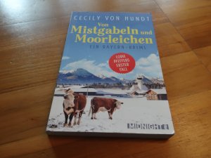 gebrauchtes Buch – von Hundt – Von Mistgabeln und Moorleichen - Ein Bayern-Krimi