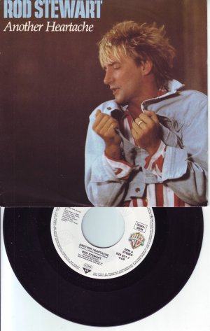 gebrauchter Tonträger – Rod Stewart – Another Heartache - You're In My Heart (The Final Acclaim) - Mit Single-Facts  (Warner Bros. Records &#8206;– 928 631-7)  Vinyl, 7 Zoll, Single, 45U/min, Schallplatte