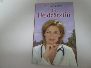 gebrauchtes Buch – Christa Canetta – Die Heideärztin. Roman. Hardcover mit Schutzumschlag