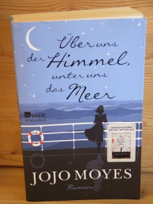 gebrauchtes Buch – Jojo Moyes – "Über uns der Himmel, unter uns das Meer" Roman