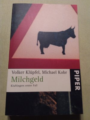 gebrauchtes Buch – Klüpfel, Volker; Kobr, Michael – Milchgeld - Kluftingers erster Fall