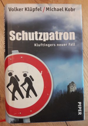 gebrauchtes Buch – Klüpfel, Volker; Kobr, Michael – Schutzpatron - Kluftingers neuer Fall