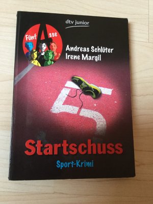 gebrauchtes Buch – Schlüter, Andreas; Margil, Irene – Startschuss Fünf Asse - Sport-Krimi