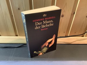 gebrauchtes Buch – Henning Mankell – Der Mann, der lächelte