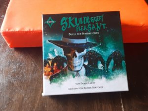 Skulduggery Pleasant - Folge 7 - Duell der Dimensionen. Gelesen von Rainer Strecker, 8 CDs Cap-Box, ca. 11 Std.