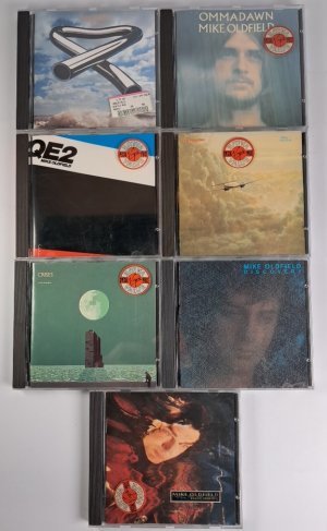 7 CDs Mike Oldfield Tubular Bells, Ommadawn, QE2, Five Miles Out, Crises, Discovery, Earth Moving