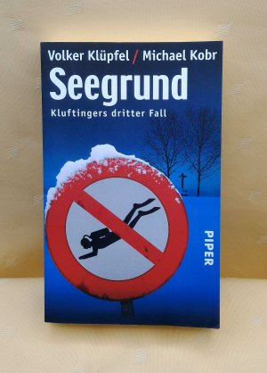 gebrauchtes Buch – Klüpfel, Volker; Kobr, Michael – Seegrund - Kluftingers dritter Fall