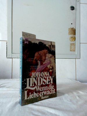 gebrauchtes Buch – Johanna Lindsey – Wenn die Liebe erwacht : Roman. [Dt. Übers. von Uschi Gnade] / Heyne-Bücher / 1 / Heyne allgemeine Reihe ; Nr. 7672.