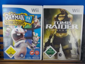 gebrauchtes Spiel – Wii Spielesammlung mit 4 Spielen mit Wii MUSIC, FAMLY SKI, TOMB RAIDER, RAYMAN