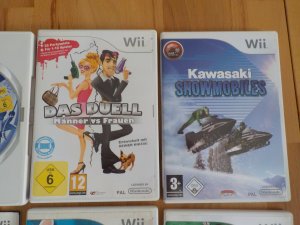 gebrauchtes Spiel – Wii Spielesammlung mit LEGO BATMAN, Das Duell Männer vs Frauen, ...Snowmobiles