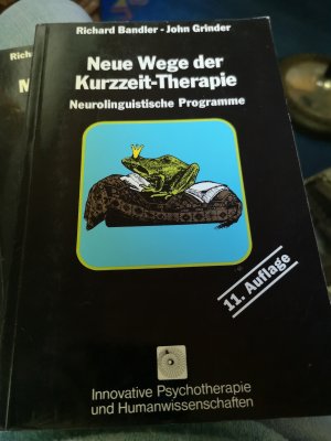 gebrauchtes Buch – John Grinder – Neue Wege der Kurzzeit-Therapie - Neurolinguistische Programme. Frogs into Princes