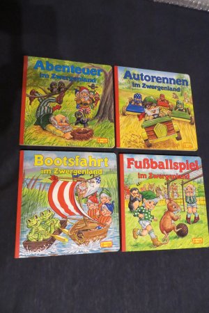 gebrauchtes Buch – Mills, Angela/Fischer – Abenteuer im Zwergenland/Autorennen im Zwergenland/Bootsfahrt im Zwergenland/Fußballspiel im Zwergenland (4 Bücher)
