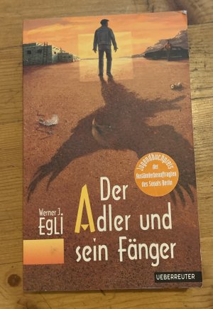 Der Adler und sein Fänger