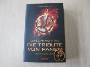 gebrauchtes Buch – Suzanne Collins – Catching Fire. Die Tribute von Panem. Gefährliche Liebe. Filmausgabe