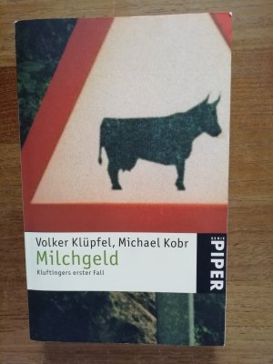 gebrauchtes Buch – Klüpfel, Volker; Kobr, Michael – Milchgeld - Kluftingers erster Fall