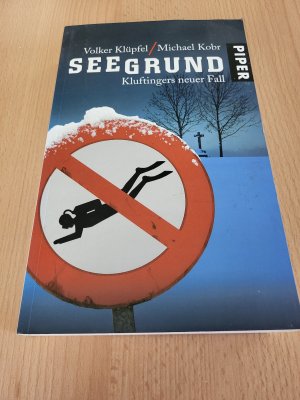 gebrauchtes Buch – Klüpfel, Volker; Kobr, Michael – Seegrund - Kluftingers neuer Fall