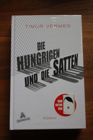 gebrauchtes Buch – Timur Vermes – Die Hungrigen und die Satten (OVP originalverpackt)