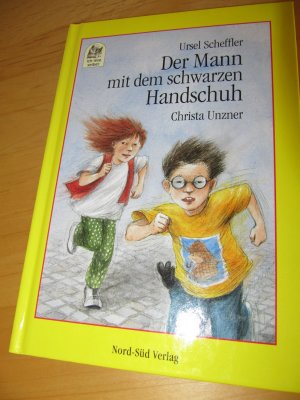 Der Mann mit dem schwarzen Handschuh