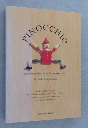 gebrauchtes Buch – Carlo Collodi – Pinocchio - Geschichte eines Hampelmanns, Ein Fortsetzungsroman, Zweisprachige Ausgabe - Italienisch / Deutsch