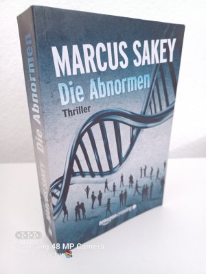 gebrauchtes Buch – Marcus Sakey – Die Abnormen ~ Thriller