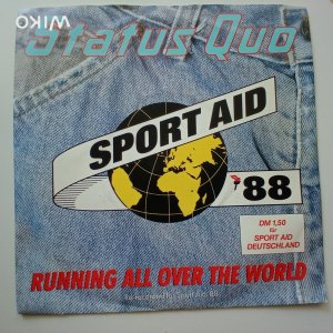 gebrauchter Tonträger – Status Quo – Running all over the World / Magic ( für Sport Aid ´88)