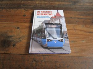 gebrauchtes Buch – Rostocker Straßenbahn AG – IN ROSTOCK UNTERWEGS - Menschen schreiben Straßenbahngeschichte