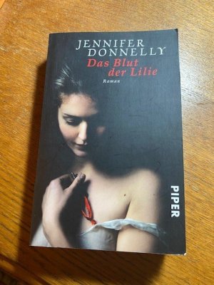 gebrauchtes Buch – Donnelly, Jennifer 128 – Das Blut der Lilie   128