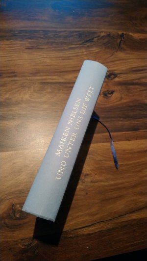 gebrauchtes Buch – Nielsen, Maike – Und unter uns die Welt