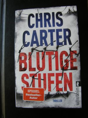 gebrauchtes Buch – Chris Carter – Blutige Stufen (Ein Hunter-und-Garcia-Thriller Band 12)