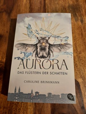 gebrauchtes Buch – Caroline Brinkmann – Aurora – Das Flüstern der Schatten