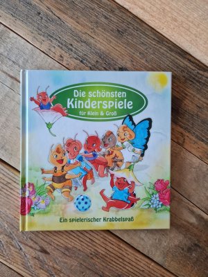 gebrauchtes Buch – Die schönsten Kinderspiele - Ein spielerischer Krabbelspaß