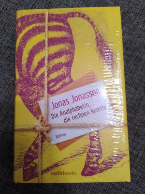 gebrauchtes Buch – Jonas jonasson – Die Analphabetin, die rechnen konnte (originalverpackt - Neu)