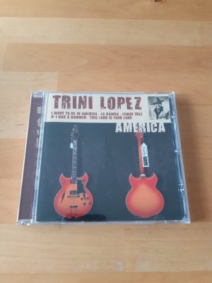 gebrauchter Tonträger – Trini Lopez – America * CD Compilation * 16 Tracks * La Bamba, Lemon Tree, u.a.