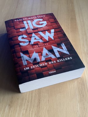 gebrauchtes Buch – Nadine Matheson – Jigsaw Man - Im Zeichen des Killers (neu + ungelesen)