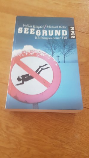 gebrauchtes Buch – Klüpfel, Volker; Kobr, Michael – Seegrund - Kluftingers neuer Fall