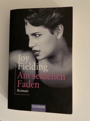 Am seidenen Faden